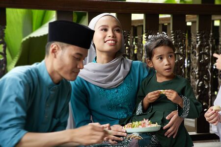 group of malay family breaking the fast togetherの写真素材
