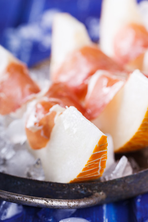 Melon with Serrano ham, sliced chilled.selective focusの写真素材