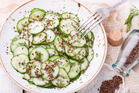 Cucumber salad with flax seeds.selective focusの写真素材