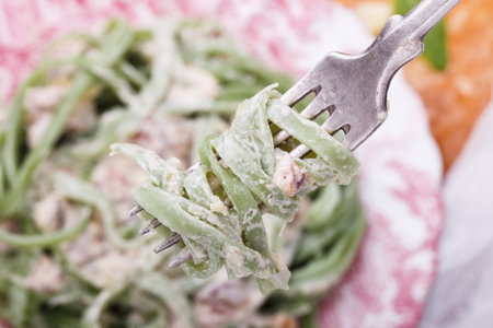 Pasta spinach, cream, garlic and Parmesanの写真素材