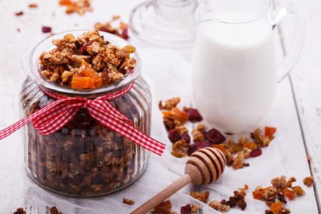 Granola from several types of cereals with nuts,honey,raisinsの写真素材