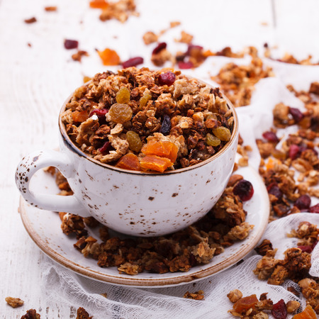 Granola from several types of cereals with nuts,honey,raisinsの写真素材