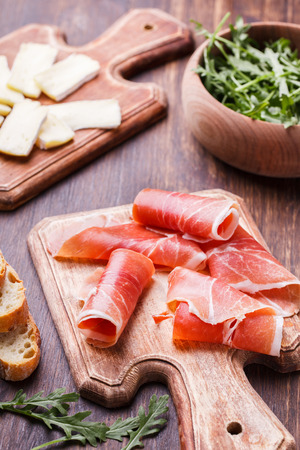 Curled Slices of  Prosciutto and the brie ,appetizer.selective focusの写真素材