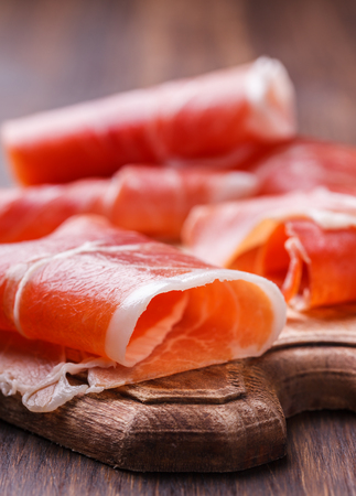 Curled Slices of  Prosciutto .selective focusの写真素材