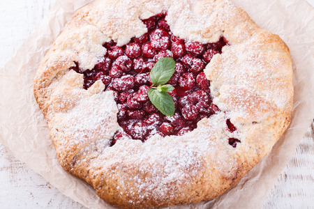 Homemade galette with cherries.selective focusの写真素材