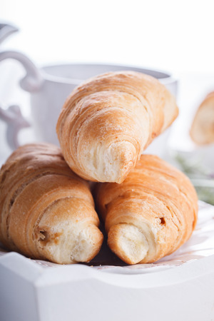 Croissants,coffee, milk on a tray,Breakfast. closeup, selective focus.の写真素材