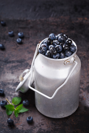 Fresh blueberries in a metal can.Healthy food concept.selective focusの写真素材