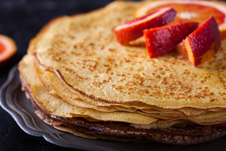 Pancakes with jam of red oranges.selective focus.の写真素材