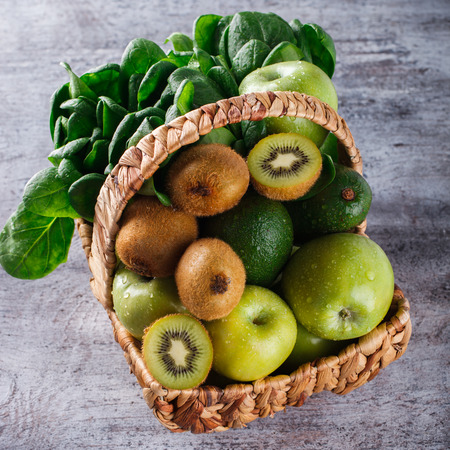 Basket of green fruit and vegetables. Healthy lifestyle.selective focus.の写真素材