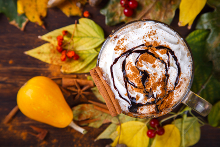 Pumpkin Smoothies, Spicy Drink is a cinnamon Latte, whipped cream. Autumn still life. selective focus.の写真素材
