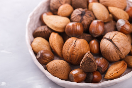 Mixed nuts.Walnuts,Brazil nuts,almonds,hazelnuts.Concept of Healthy Eating.selective focus.の写真素材