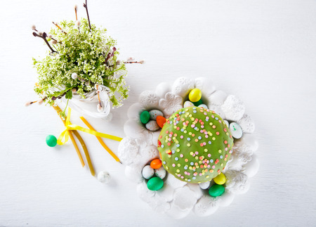 Easter cake and colorful eggs for the Traditional Holiday table.selective focus.の写真素材