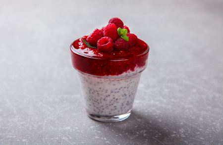 Yogurt with Fresh Raspberries and Chia seeds and mint.Concept Of A Healthy Breakfast.selective...