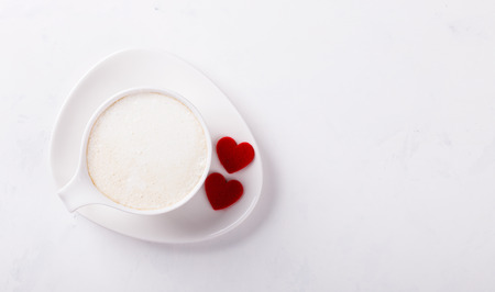 White Coffee Cup with Milk on a light Background.の写真素材