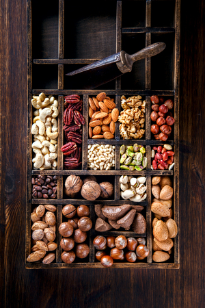Nuts Mixed in a Wooden Vintage Box.の写真素材