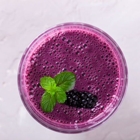 BlackBerry smoothie with Fresh Berries in glasses.Food or Healthy diet concept.Vegetarian. selective focus.の写真素材