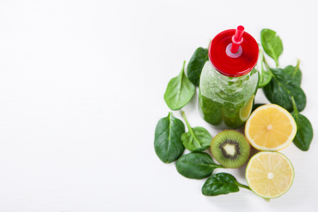 Smoothies Green. Drink Cocktail Spinach,Apple,Kiwi,Lemon,lime,avocado.Food or Healthy diet concept.Vegetarian.Copy space for Text. selective focus.の写真素材