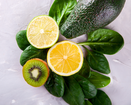 Green Vegetables,Fruits,Citrus on a White Background.Food or Healthy diet concept.Vegetarian.Copy space for Text. selective focus.の写真素材