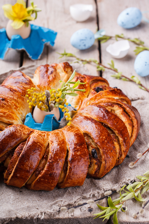 Easter bread with egg decoration and flowers.selective focusの写真素材