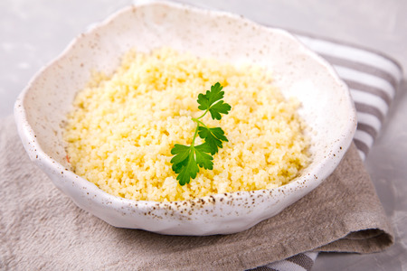 Couscous with parsley in the bowl..Concept of Healthy Food.Food or Healthy diet concept.Super Food.Vegetarian.Copy space for Text.の写真素材