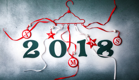 Christmas and New Year Background Green colour Wooden Figures 2018 Holiday Symbol Snow Top View...
