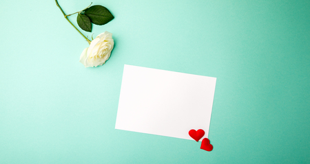 Flower White Rosas on the Colorful Background Holiday Natural Valentine's Day Gift Letter with Love Heart Shape Flat Lay Top View Copy space for textの写真素材