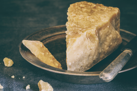 Parmesan cheese Vintage style Background Toned imageの写真素材