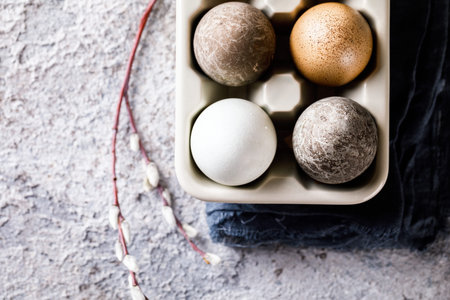 Stylish different color Easter eggs. Homemade naturally dyed.  Holiday background. Festive tradition