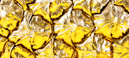 Creative layout made gold pineapple on brightly yellow background.Minimal style.  Tropical Food concept.Summer Idea .Copy space for Text.の写真素材