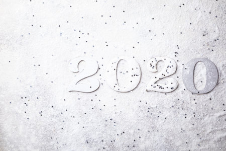 Wooden numbers concept on a snowy