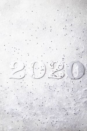 Wooden numbers concept on a snowyの写真素材