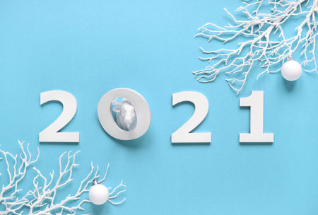 White bull symbol of New Year on blue background.Greeting card Happy New Year.Copy space