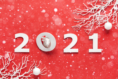 White bull symbol of New Year on a red background.Greeting card Happy New Year.Copy space Banner