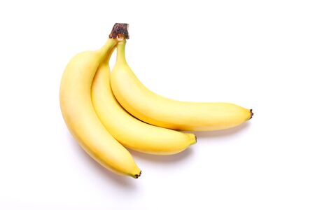 Ripe bananas isolated on whiteの写真素材