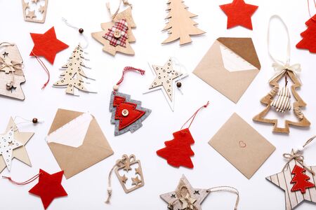 Christmas wooden decorations on white backgroundの写真素材