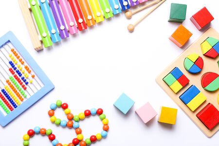Colorful kids toys on white background. Top view, flat lay.の写真素材