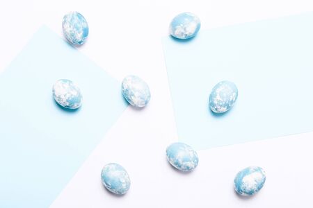 Happy Easter background. Easter eggs on white background, top viewの写真素材