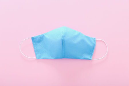 Medical mask, Medical protective mask on blue background. Healthcare and medical concept.の写真素材