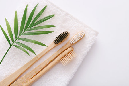 Wooden teeth brushes on white backgroud. Zero waste concept