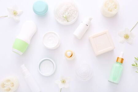 Top view of cosmetic products with natural ingredients on white background for natural beauty.の写真素材