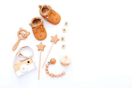 Set of baby stuff and accessories on white background. Baby shower concept. Fashion newborn. Flat...
