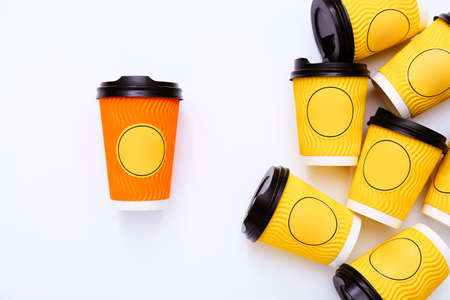 Cups of coffee on white desk Concept of soical distancing, new normal. Individuality conceptの写真素材