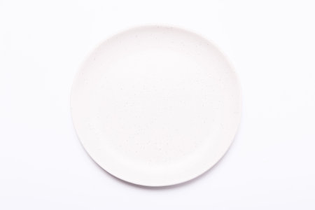 Ceramic plate on a white background. Top view