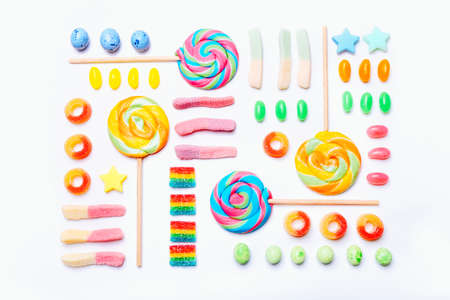 Mixed collection of colorful candy, on white background. Flat lay, top viewの写真素材