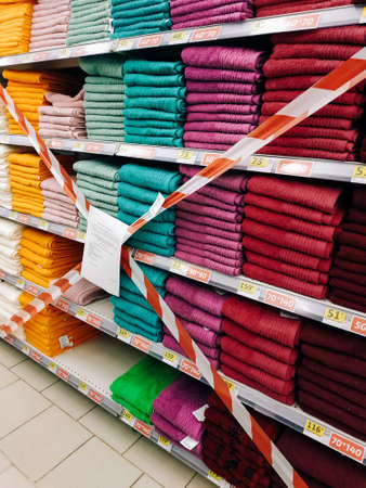 Supermarket shelf taped off, products not for sale during lockdown. Mykolaiv, Ukraine - January 10, 2021のeditorial素材