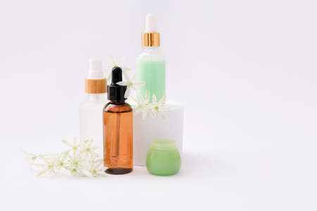 Natural cosmetic skincare bottle containers on light background. Natural beautyの写真素材
