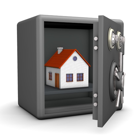 A house in the opened safe  White background の写真素材
