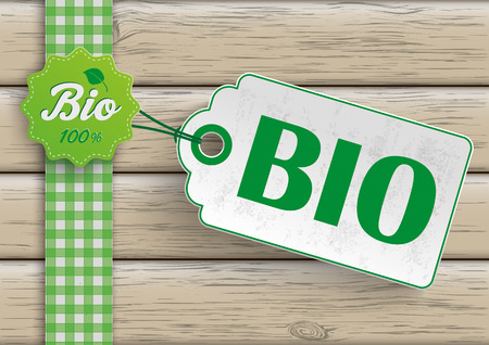 Bio food label with price sticker on the wooden background. Eps 10 vector file.のイラスト素材