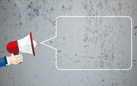 Hand with bullhorn and speech bubble on the concrete background. Eps 10 vector file.のイラスト素材