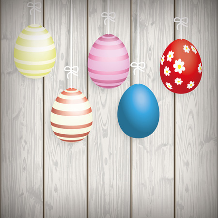 5 easter eggs on the wooden background.  のイラスト素材